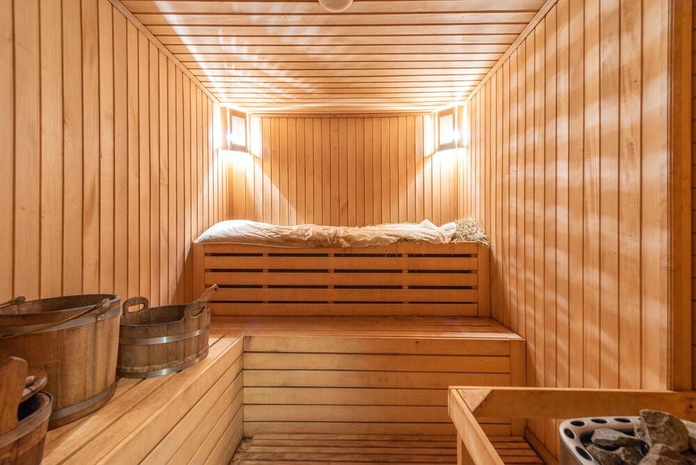Dry sauna installation by skilled electricians for improved body detoxification.